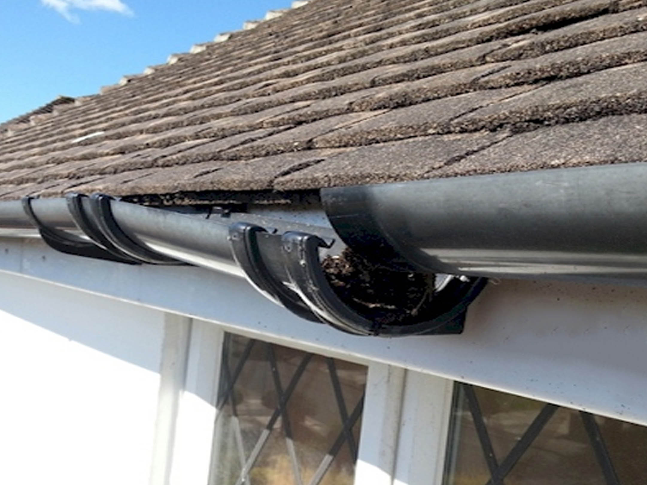 Broken Roof Gutter Drain Pipe